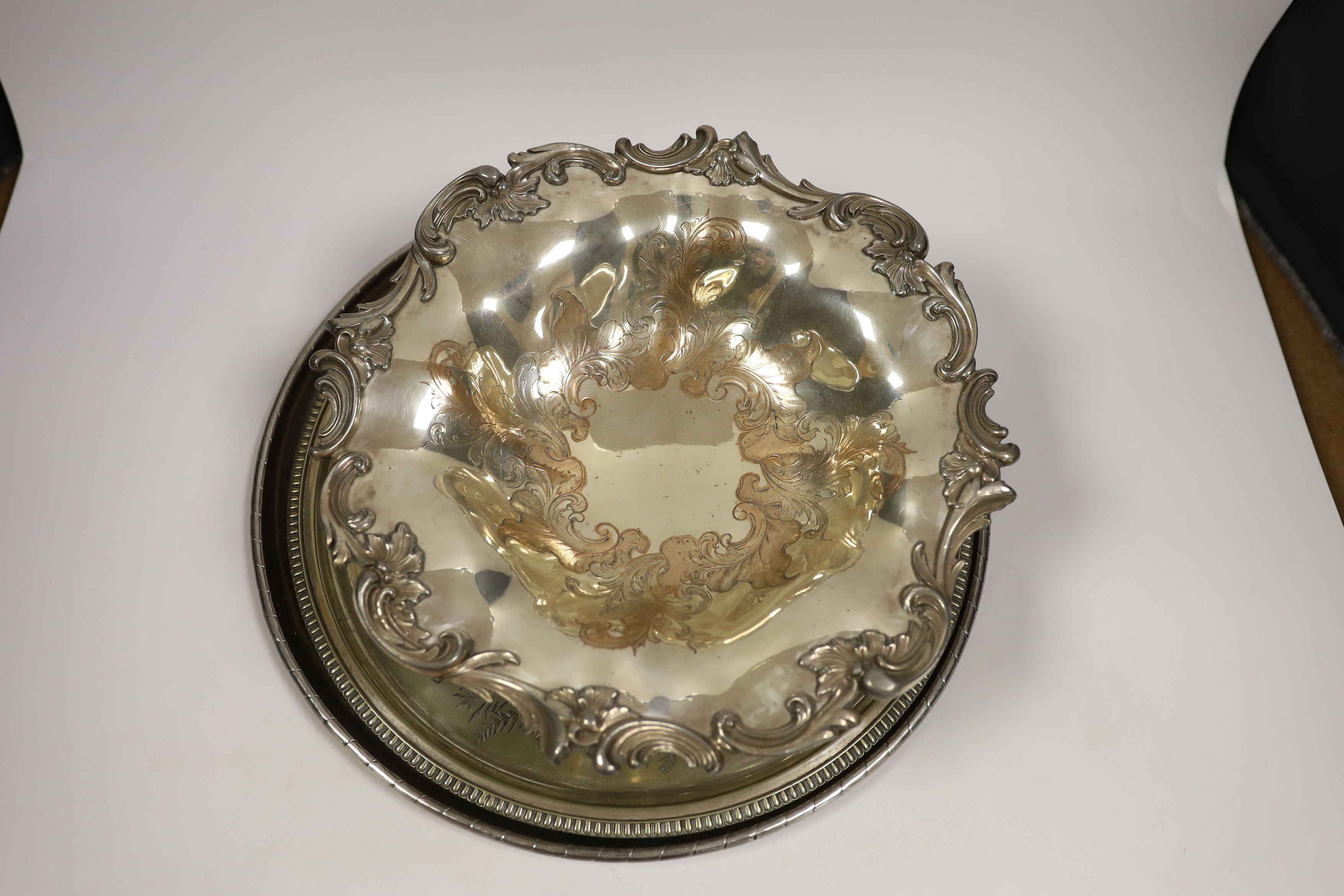 An Old Sheffield plate bowl, five napkin rings, and two salvers, largest 38cm diameter